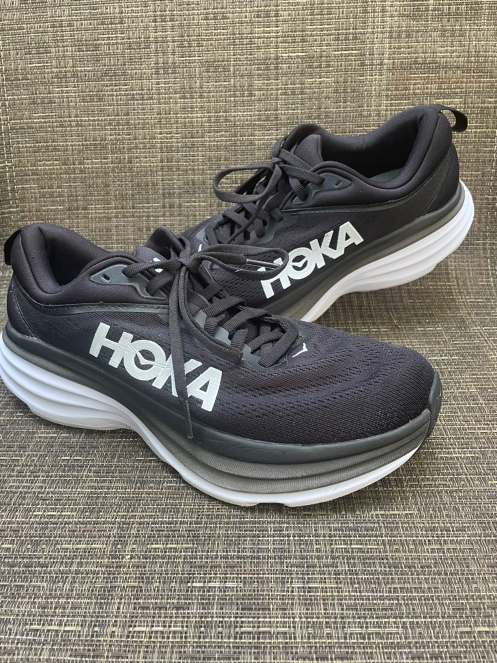 HOKA Bondi 8 running shoes in the black and white colorway. Nice Condition!